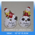 Candle shape ceramic christmas decoration with snowman figurine